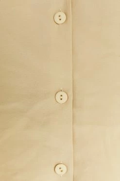 DISSH Boutiques EBONY OVERSIZED STONE BUTTON UP TOP