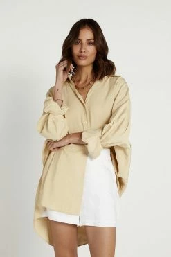 DISSH Boutiques EBONY OVERSIZED STONE BUTTON UP TOP