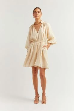 DISSH Boutiques EMPIRE BUTTER SMOCK MINI DRESS