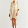DISSH Boutiques EMPIRE BUTTER SMOCK MINI DRESS