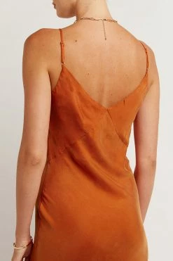 DISSH Boutiques PELLY BURNT ORANGE SLIP MIDI DRESS
