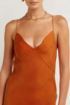 DISSH Boutiques PELLY BURNT ORANGE SLIP MIDI DRESS