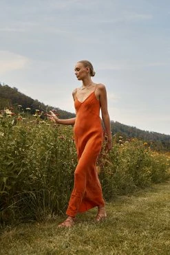 DISSH Boutiques PELLY BURNT ORANGE SLIP MIDI DRESS