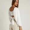 DISSH Boutiques LOVER WHITE LONG SLEEVED CROP TOP