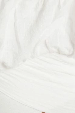 DISSH Boutiques LOVER WHITE LONG SLEEVED CROP TOP