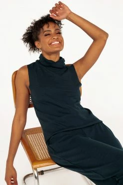 DISSH Boutiques MAYA HIGH NECK NAVY KNIT TOP