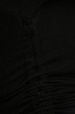 DISSH Boutiques BLANCO BLACK DRAWSTRING KNIT TOP TOPS